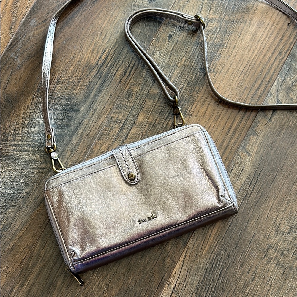 The Sak Silver Crossbody Clutch Wallet with Strap